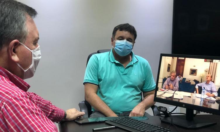 Michlig y sus pares departamentales en teleconferencia con Perotti